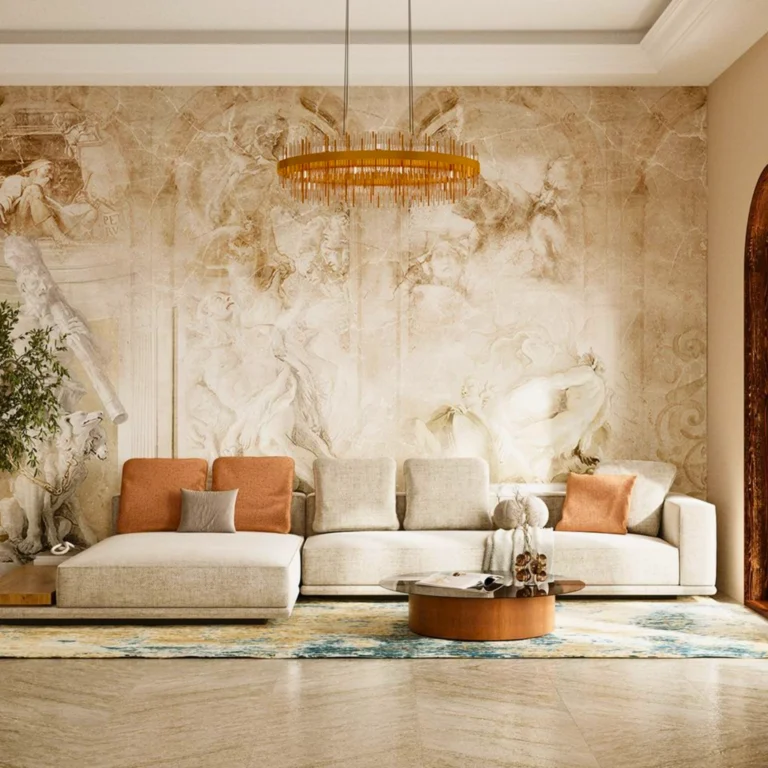 Elegant living room with a large beige sectional sofa, rust-colored pillows, a round wooden coffee table, an artistic mural wall, gold chandelier, green plant, and a patterned area rug.